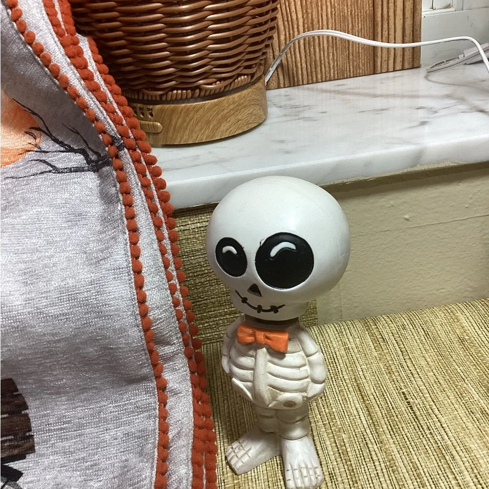 Tahari Halloween Skeleton and Cat Decor placemats and decor